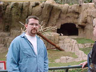 Tom was fresh but the panda was tired, but both agreed to pose for a picture.