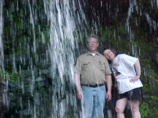 We went hiking in <a href='http://www.nps.gov/grsm/index.htm' class=tree2> the Smoky National park.</a> Carol and Tim found a waterfall to climb under.