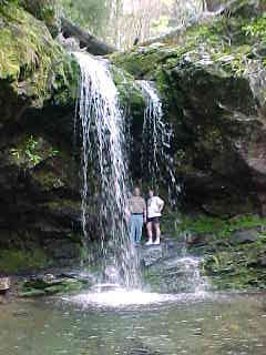 Carol and Tim under the waterfall.